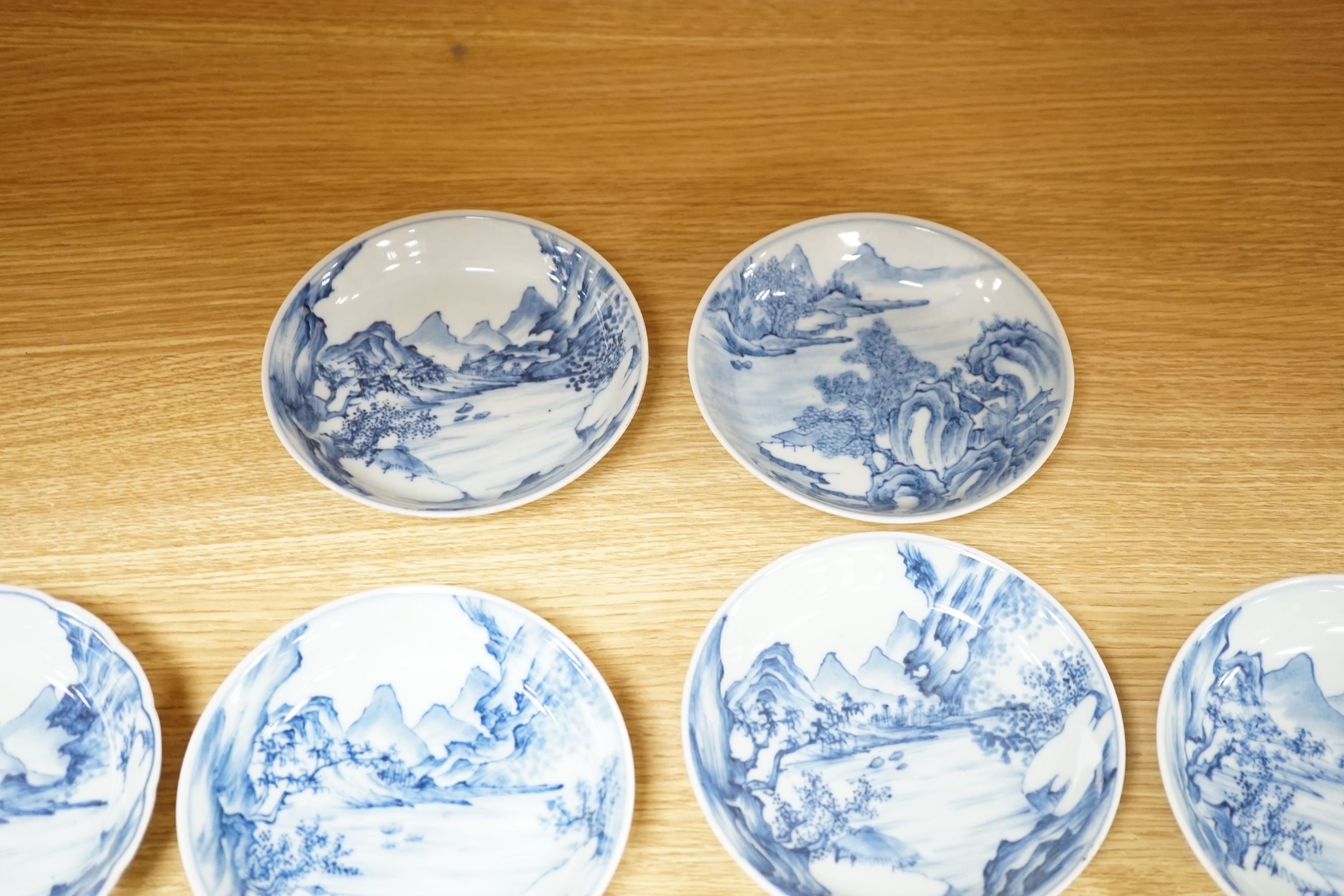 Ten Chinese blue and white ‘landscape’ dishes, 13.5cm diameter